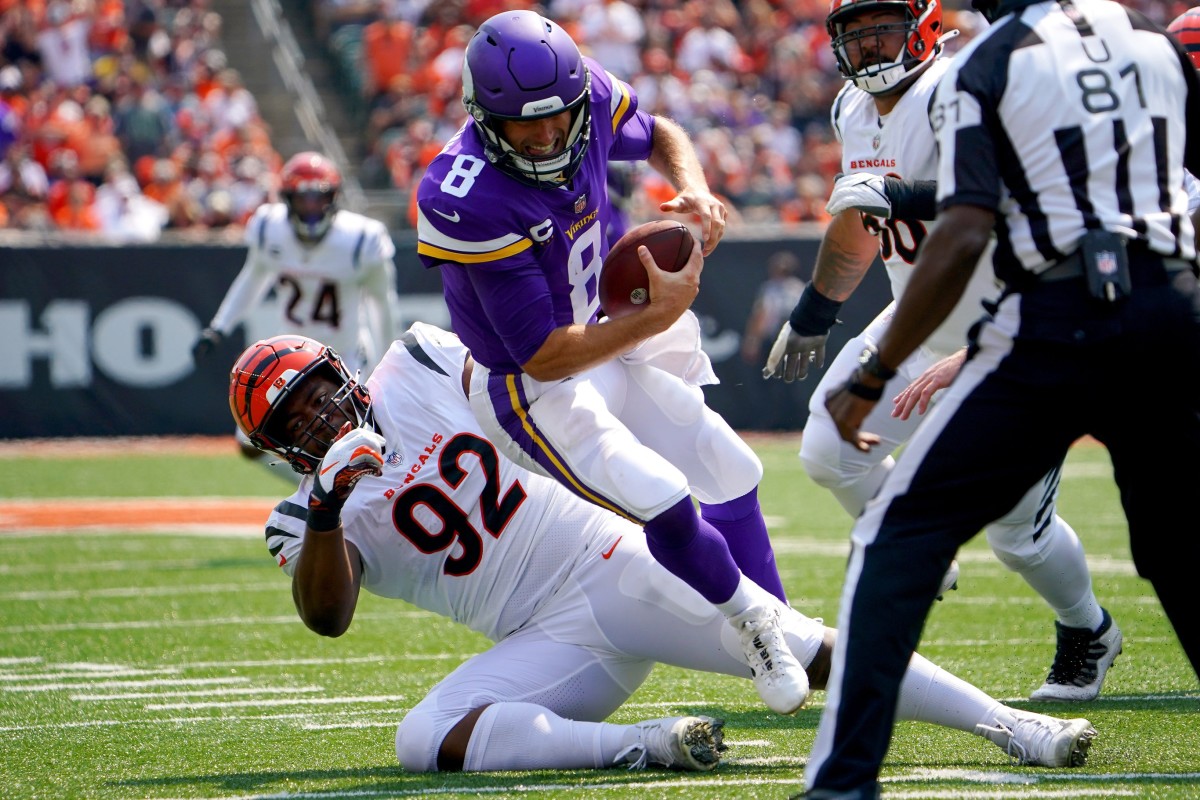 Cincinnati Bengals DT B.J. Hill (92) sacks Minnesota Vikings quarterback Kirk Cousins (8) © Kareem Elgazzar via Imagn Content Services, LLC