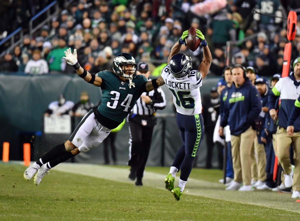 Jan 5, 2020; Philadelphia, Pennsylvania, USA; Seattle Seahawks wide receiver Tyler Lockett (16) catches a pass as Philadelphia Eagles cornerback Cre'von LeBlanc (34) defends during the second quarter in a NFC Wild Card playoff football game at Lincoln Financial Field. Mandatory Credit: Eric Hartline-USA TODAY Sports