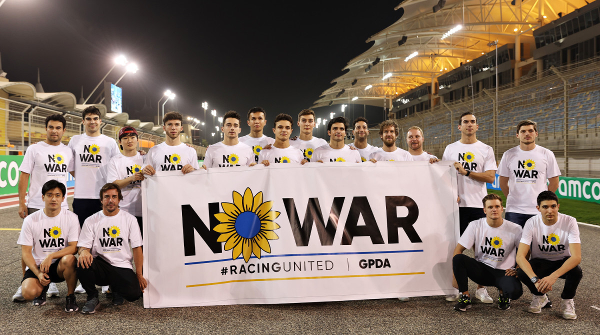 BAHRAIN, BAHRAIN - MARCH 09: F1 drivers pose with a banner promoting peace and sympathy with Ukraine prior to F1 Testing at Bahrain International Circuit on March 09, 2022 in Bahrain, Bahrain.