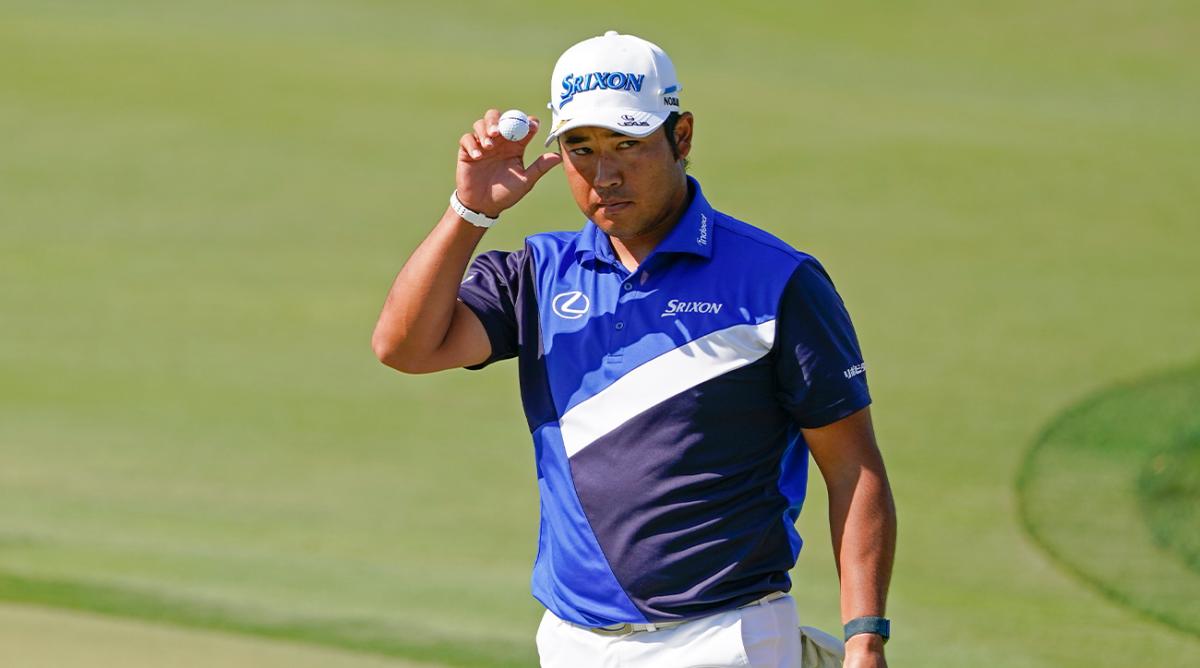 Hideki Matsuyama tips his hat to the gallery after sinking a putt on the eighth green during the second round of the Arnold Palmer Invitational golf tournament Friday, March 4, 2022, in Orlando, Fla.