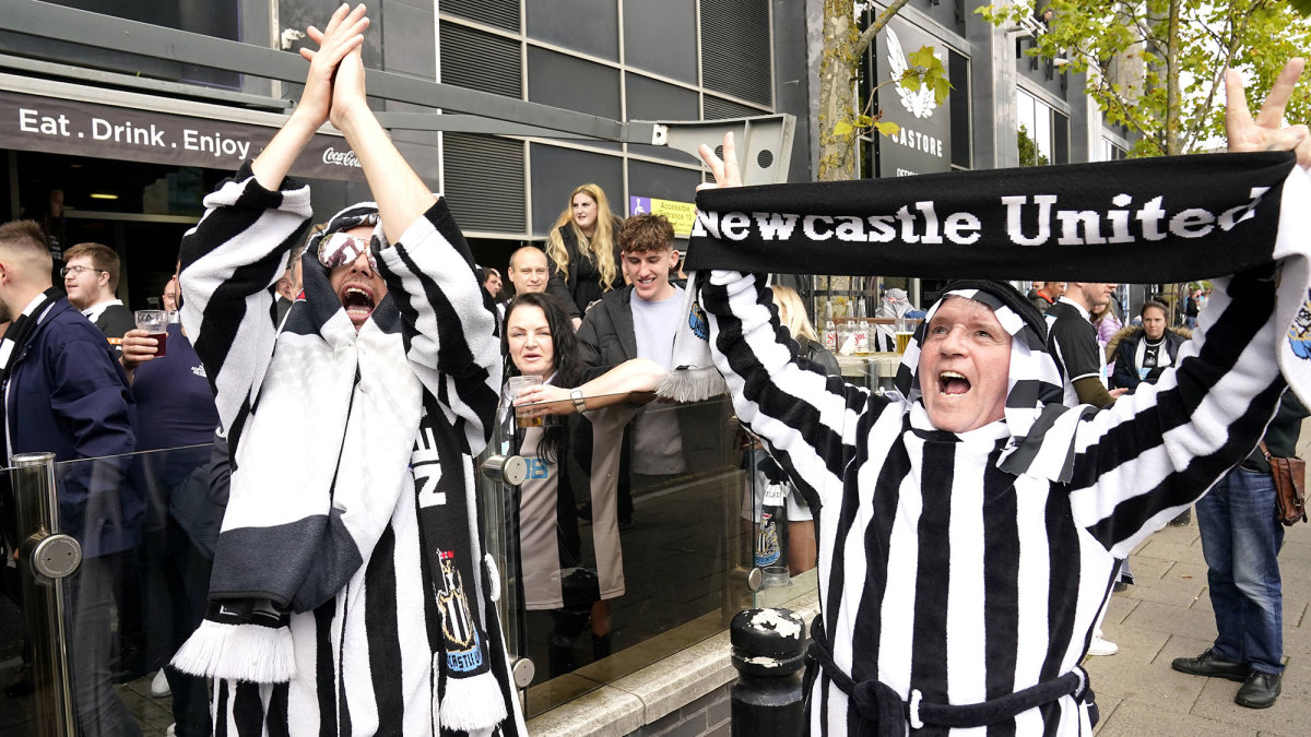 Newcastle fans celebrate Saudi Arabia’s takeover of the club