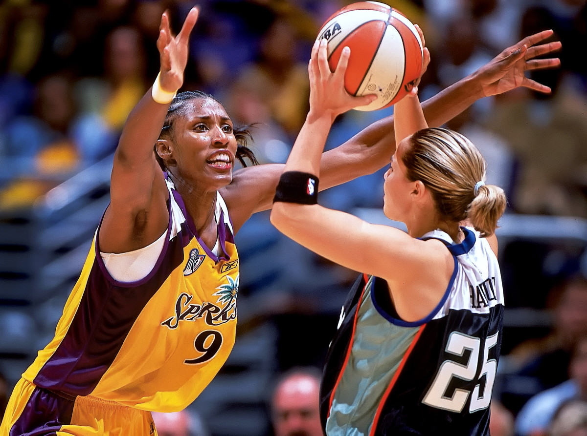 2002 WNBA Finals: Lisa Leslie of the Sparks defending against Becky Hammon of the Liberty.