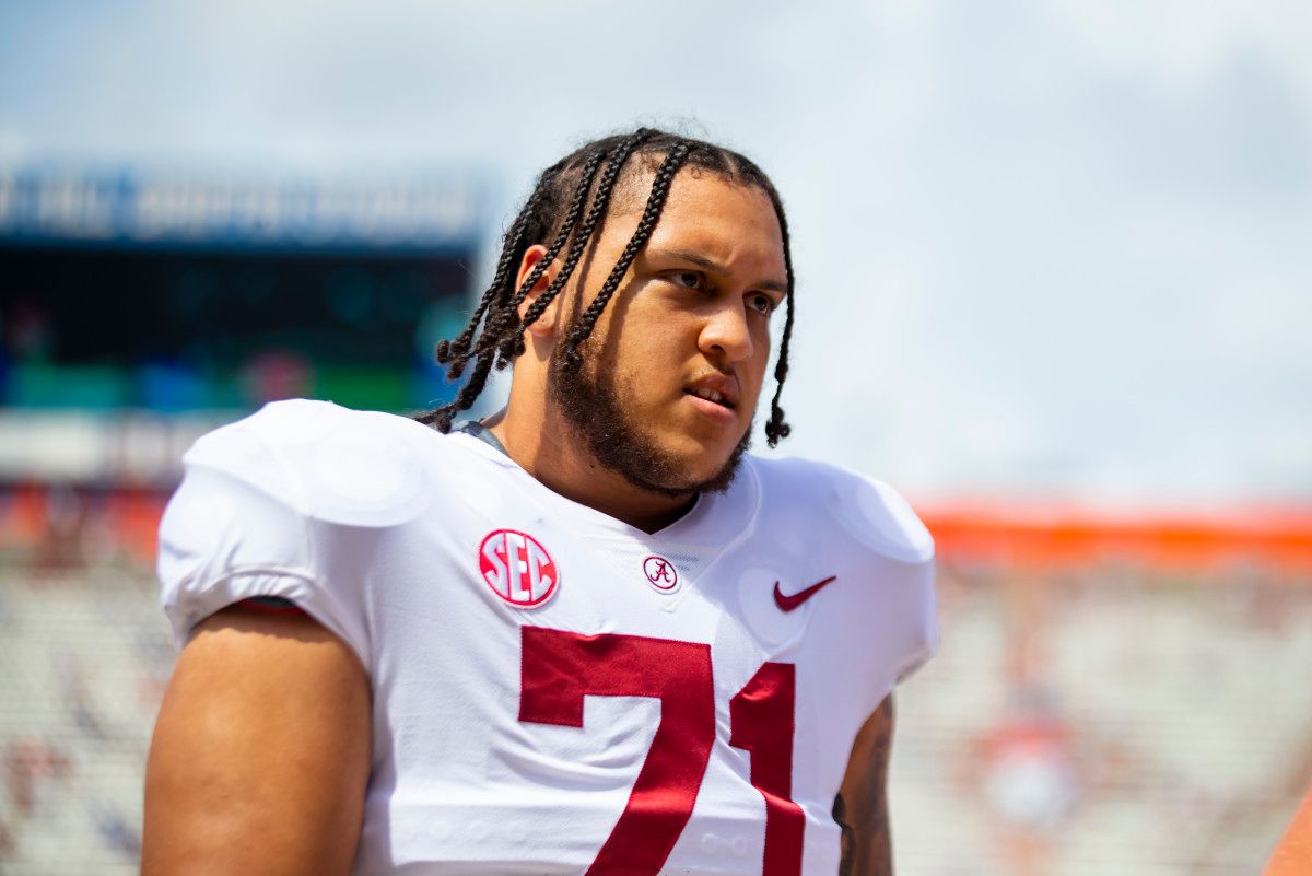 Alabama Crimson Tide offensive lineman Darrian Dalcourt (71) against the Florida Gators at Ben Hill Griffin Stadium.