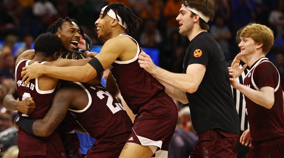 Mar 11, 2022; Tampa, FL, USA;Texas A&M Aggies guard Quenton Jackson (3) and teammates celebrate as they beat the Auburn Tigers at Amalie Arena.