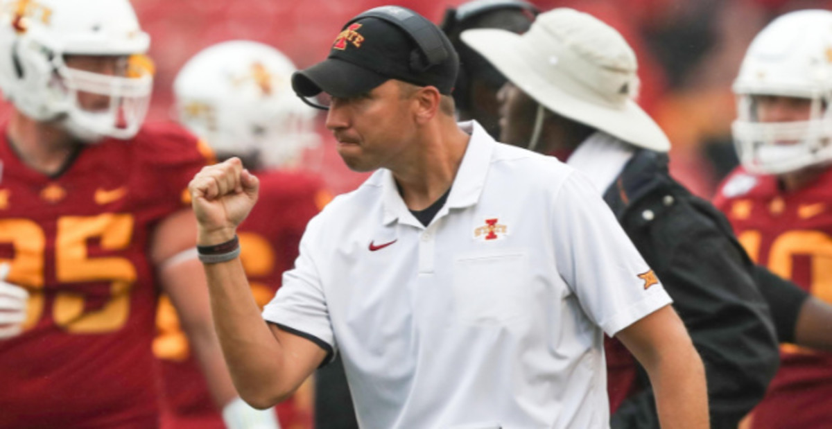 Iowa State Cyclones head coach Matt Campbell celebrates during a college football game.