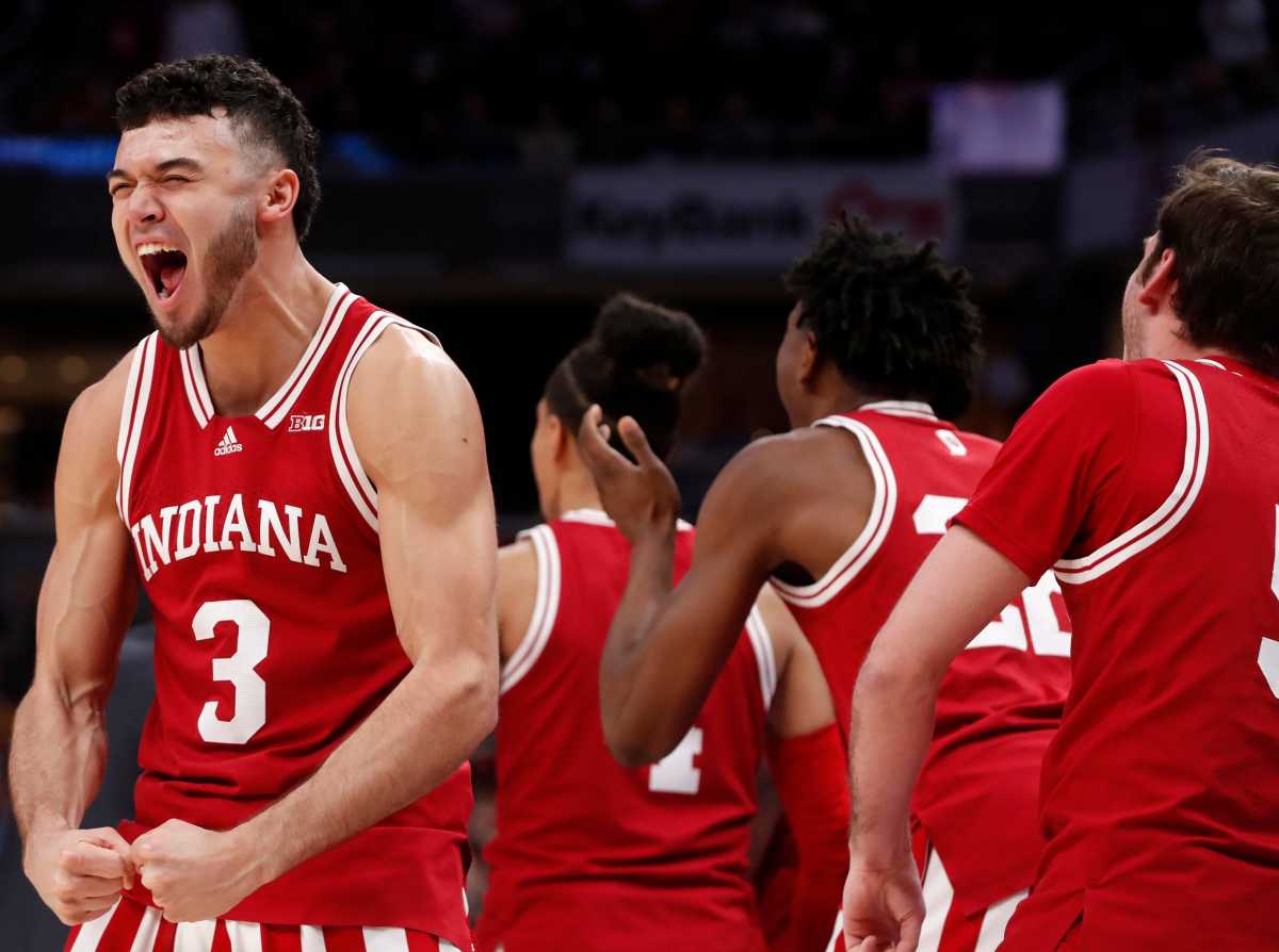 Anthony Leal cheers with Indiana's bench.