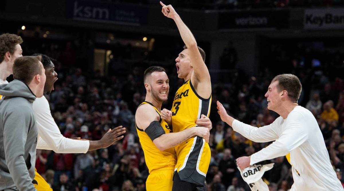 Iowa celebrates after defeating Indiana