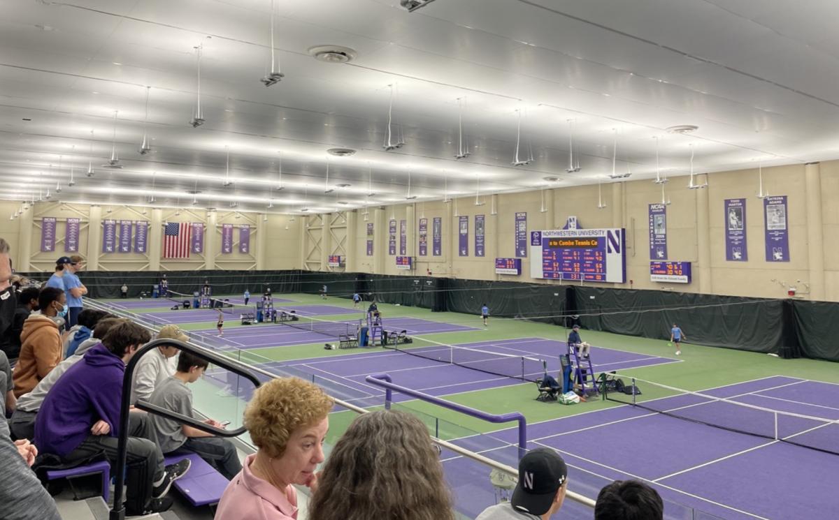 Fans watch singles matches between Northwestern and Columbia at Combe Tennis Center on Saturday, March 12, 2022.
