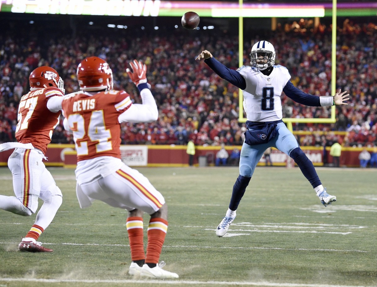 Tennessee Titans quarterback Marcus Mariota (8) throws a pass that was deflected by Kansas City but was ultimately caught by Mariota for a touchdown during the AFC Wild Card game. Andrew Nelles / Tennessean.com / USA TODAY NETWORK