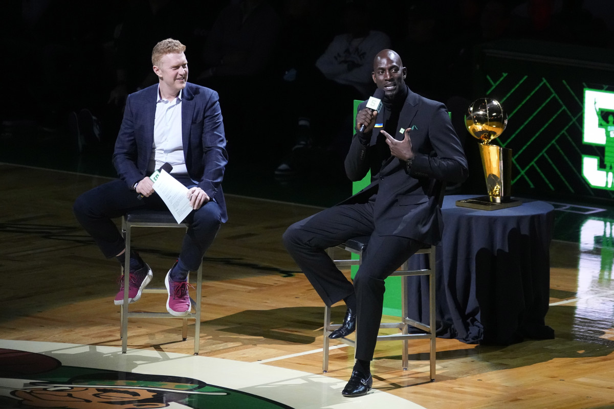 Basketball Hall of Famer and former Boston Celtic, Kevin Garnett speaks with Brian Scalabrine during the number retirement ceremony after the game between the Boston Celtics the Dallas Mavericks at TD Garden. Mandatory Credit: Gregory Fisher-USA TODAY Sports