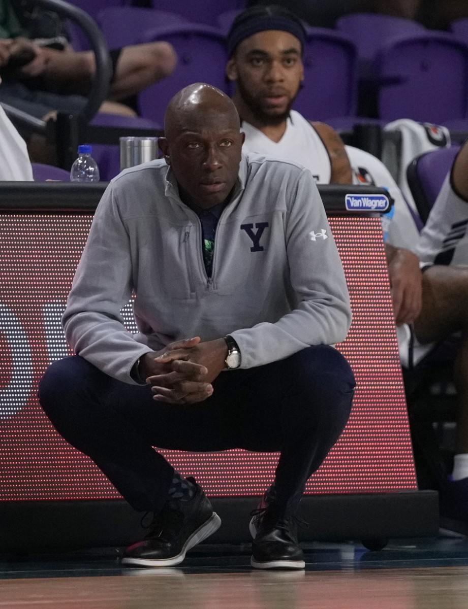 Nov 24, 2021; Fort Myers, FL, USA; Yale Bulldogs head coach James Jones watches from the sideline during the first half against the Milwaukee Panthers at Suncoast Credit Union Arena.