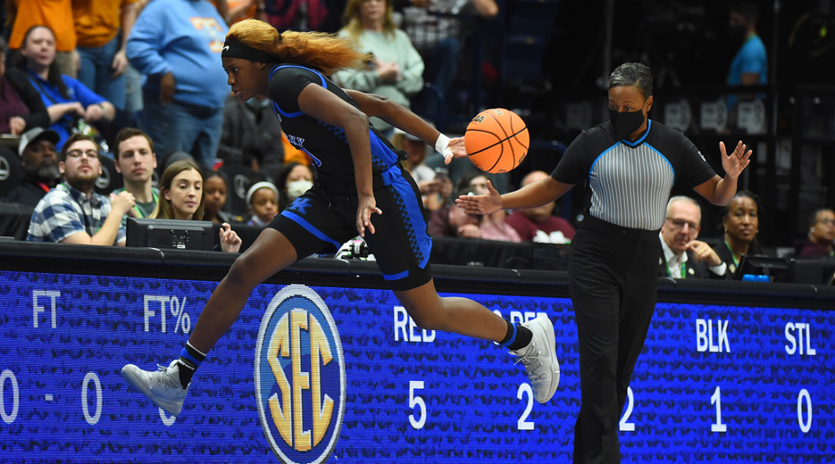 Kentucky Wildcats guard Rhyne Howard (10) saves the ball on the sideline during the first half against the Tennessee Lady Vols at Bridgestone Arena.