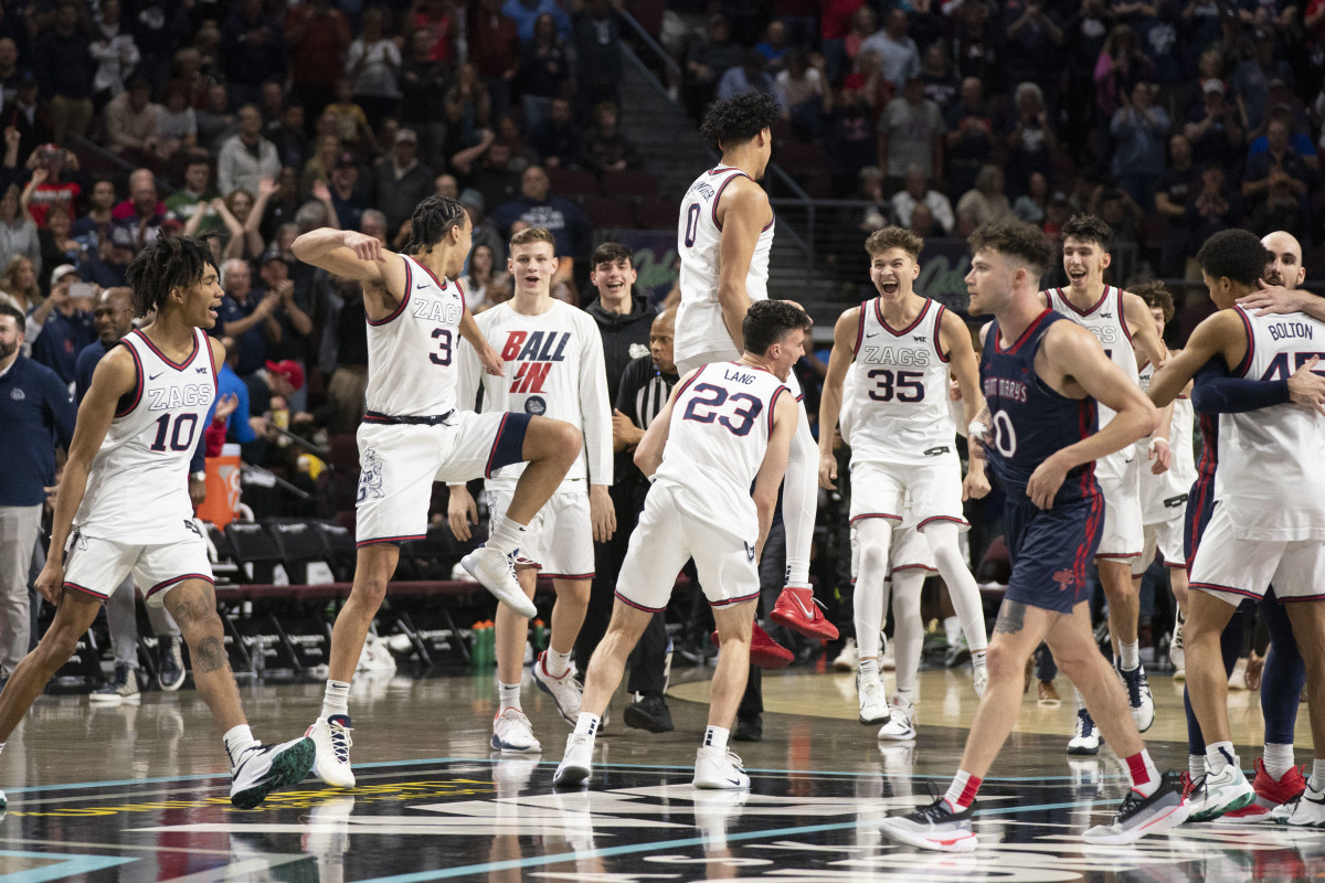 March 8, 2022; Las Vegas, NV, USA; Gonzaga Bulldogs celebrate after defeating the Saint Mary's Gaels after the game in the finals of the WCC Basketball Championships at Orleans Arena.