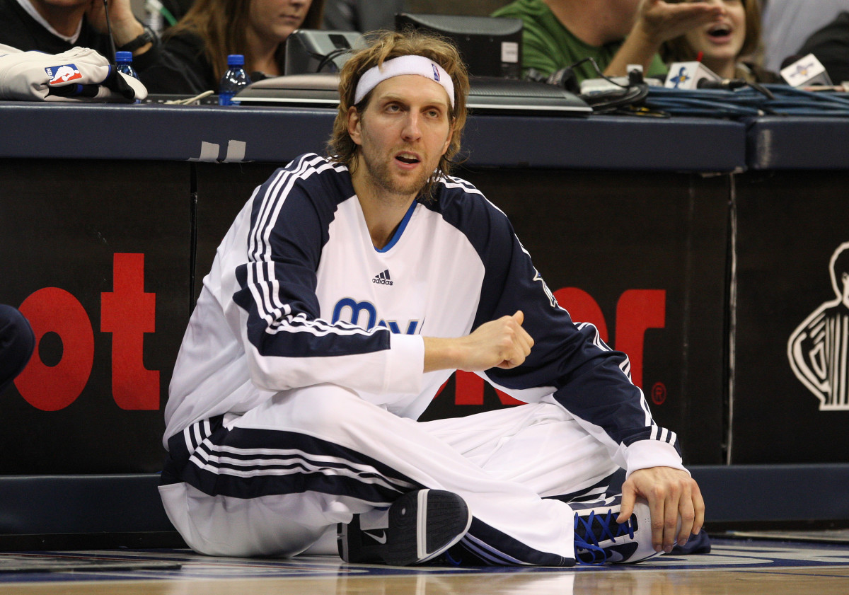 Dec 14, 2009; Dallas, TX, USA; Dallas Mavericks forward Dirk Nowitzki (41) on the sidleines waits to enter the game against the New Orleans Hornets at American Airlines Arena. The Mavs beat the Hornets 94-90.