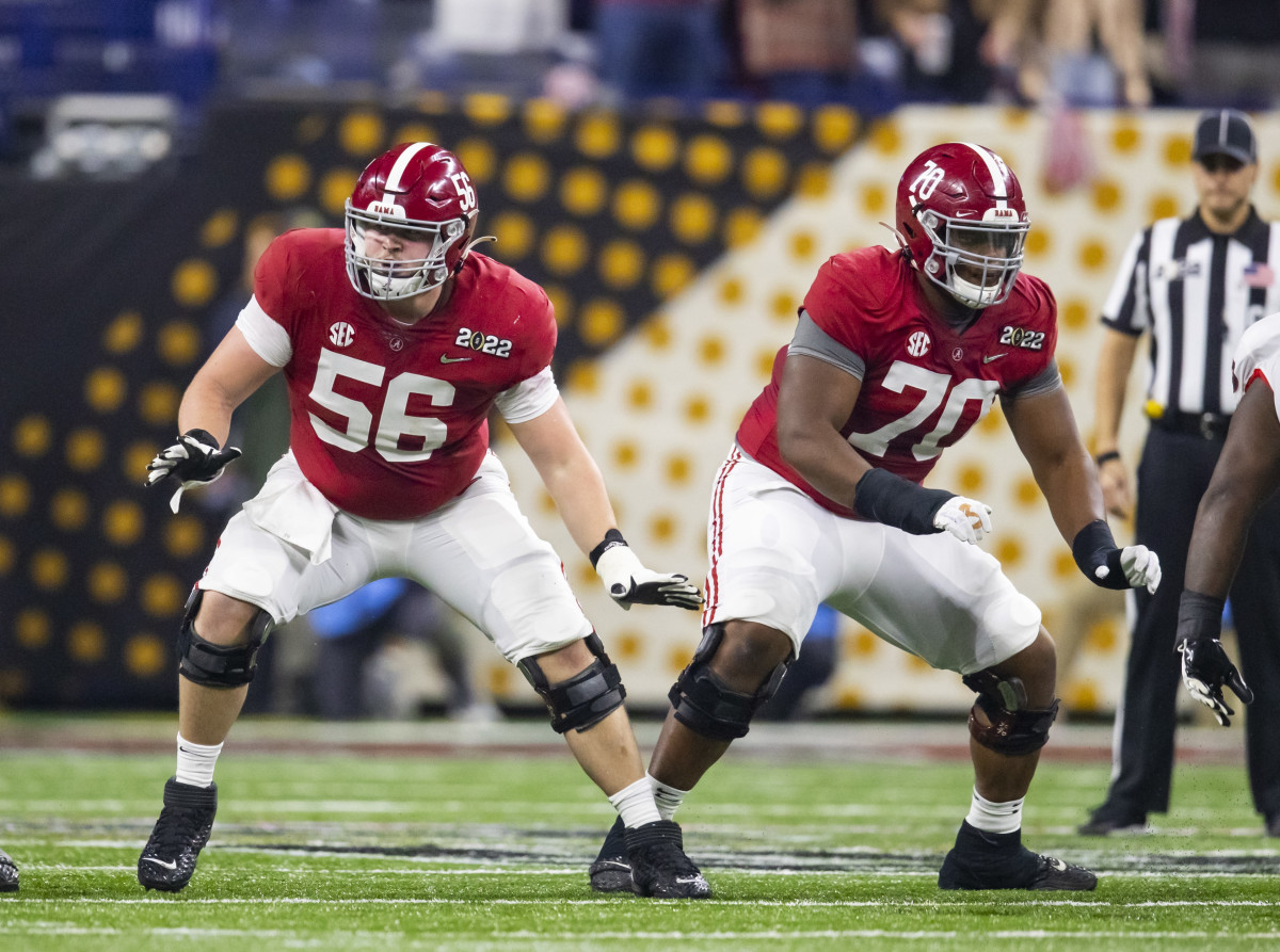 Alabama Crimson Tide offensive lineman Seth McLaughlin (56) and Javion Cohen (70) against the Georgia Bulldogs in the 2022 CFP college football national championship game at Lucas Oil Stadium.