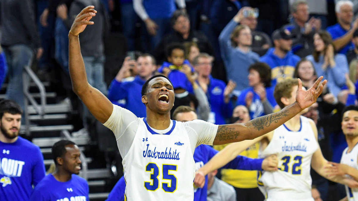 South Dakota State’s Doug Wilson lifts his arms in celebration