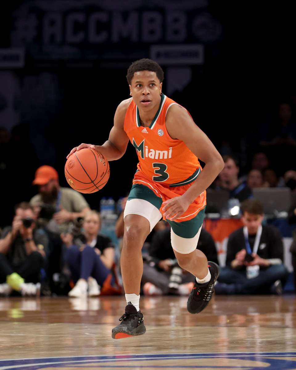 Mar 11, 2022; Brooklyn, NY, USA; Miami Hurricanes guard Charlie Moore (3) brings the ball up court against the Duke Blue Devils during the second half of the ACC Tournament semifinal game at Barclays Center. Mandatory Credit: Brad Penner-USA TODAY Sports