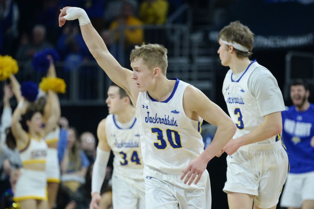 Mar 8, 2022; Sioux Falls, SD, USA; South Dakota State Jackrabbits guard Charlie Easley (30) celebrates a three point shot against the North Dakota State Bison in the second half at Denny Sanford Premier Center. Mandatory Credit: Steven Branscombe-USA TODAY Sports