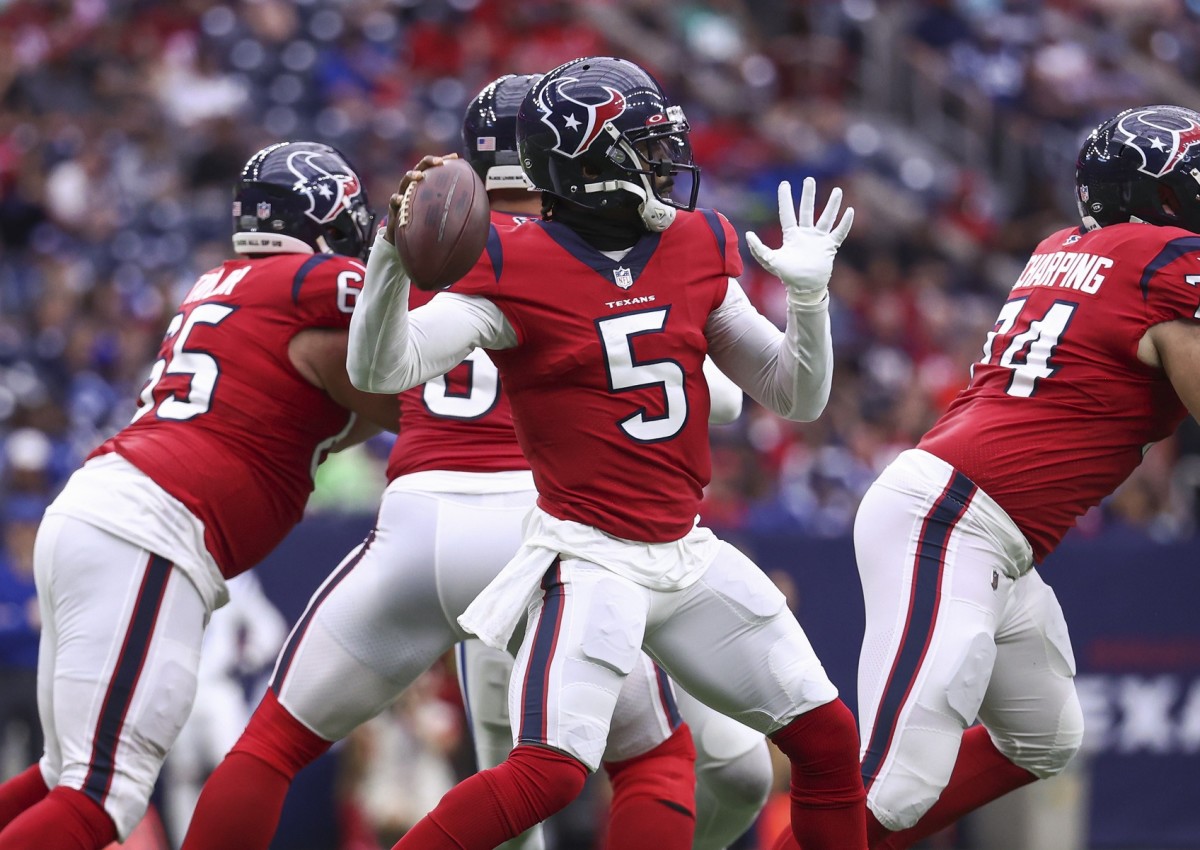 Dec 5, 2021; Houston, Texas, USA; Houston Texans quarterback Tyrod Taylor (5) attempts a pass during the first quarter against the Indianapolis Colts at NRG Stadium.