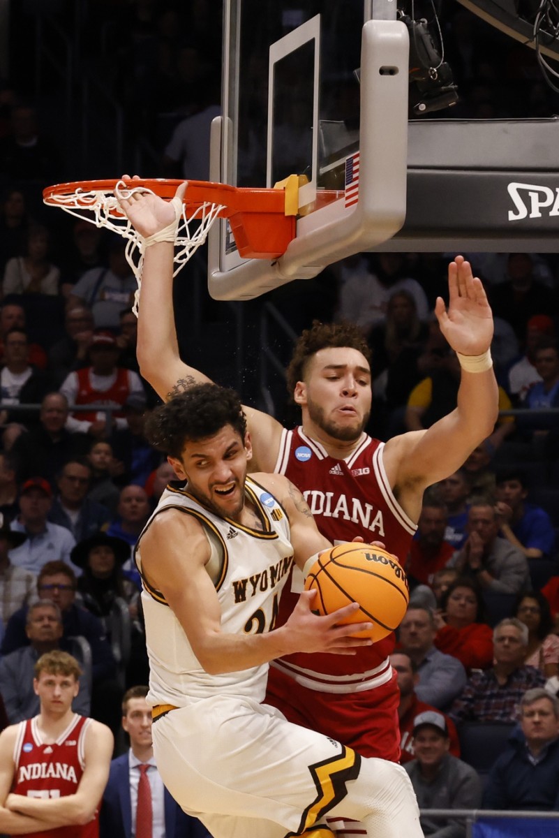 Wyoming guard Hunter Maldonado (24) is sealed off by Indiana forward Race Thompson duiring the Hoosiers' 66-58 win on Tuesday in the First Four in Dayton, Ohio. (Rick Osentoski/USA TODAY Sports)