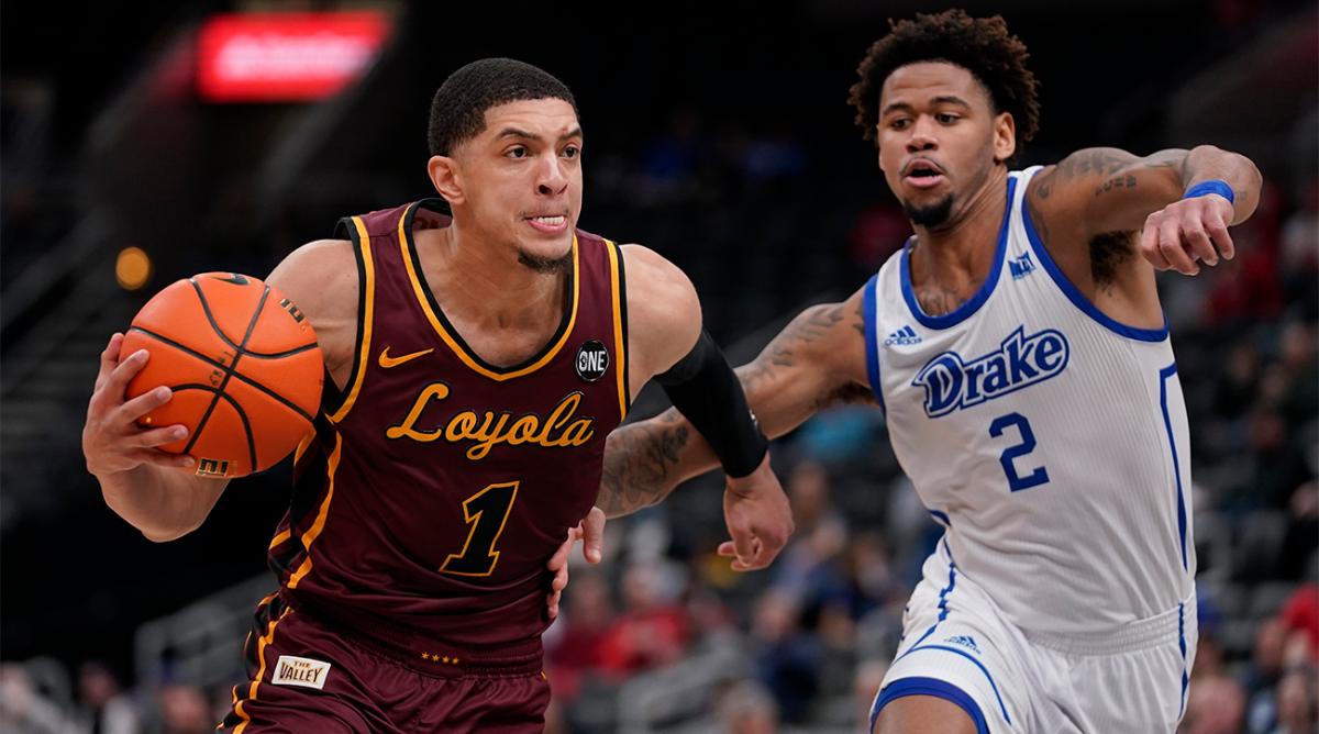 Loyola of Chicago’s Lucas Williamson (1) heads to the basket as Drake’s Tremell Murphy (2) defends during the second half of an NCAA college basketball game in the championship of the Missouri Valley Conference tournament Sunday, March 6, 2022, in St. Louis.