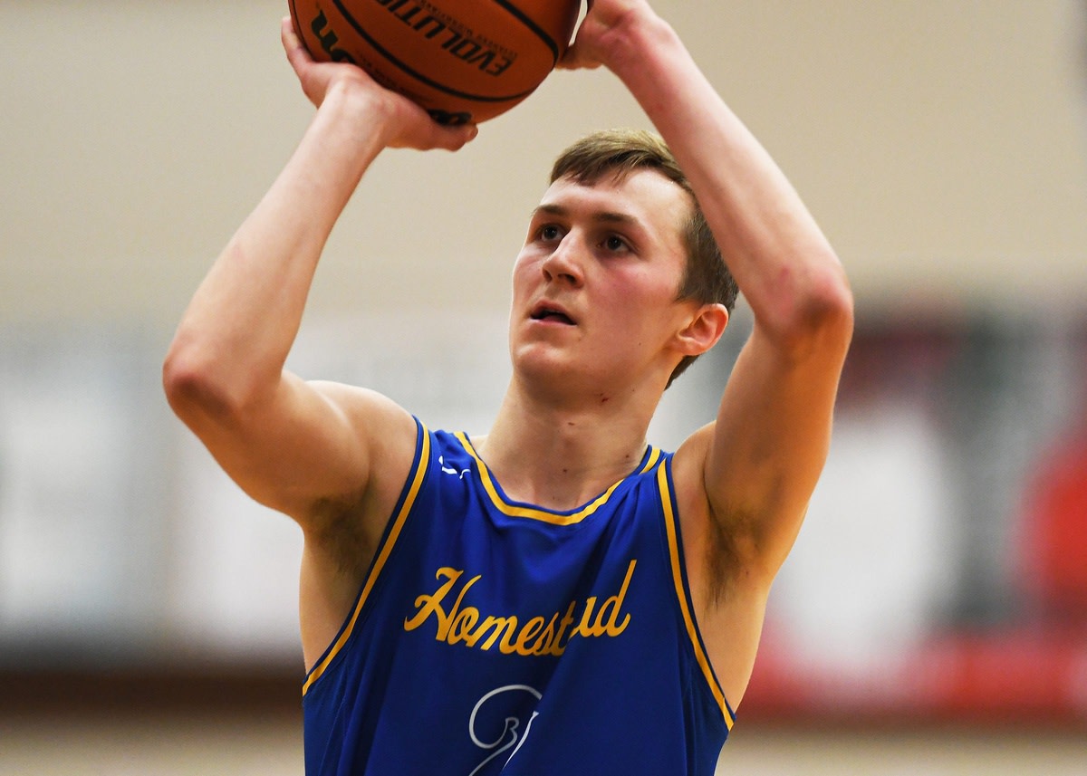 Homestead Spartans' Fletcher Loyer (2) shoots a free throw in overtime against the Lawrence North Wildcats during the game Saturday, Jan. 23, 2021, at Lawrence North High School. The Homestead Spartans defeated Lawrence North Wildcats 55-50 in overtime.