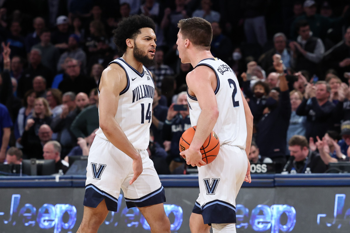 Mar 12, 2022; New York, NY, USA; Villanova Wildcats guard Collin Gillespie (2) celebrates with guard Caleb Daniels (14) during the second half against the Creighton Bluejays at Madison Square Garden. Mandatory Credit: Vincent Carchietta-USA TODAY Sports
