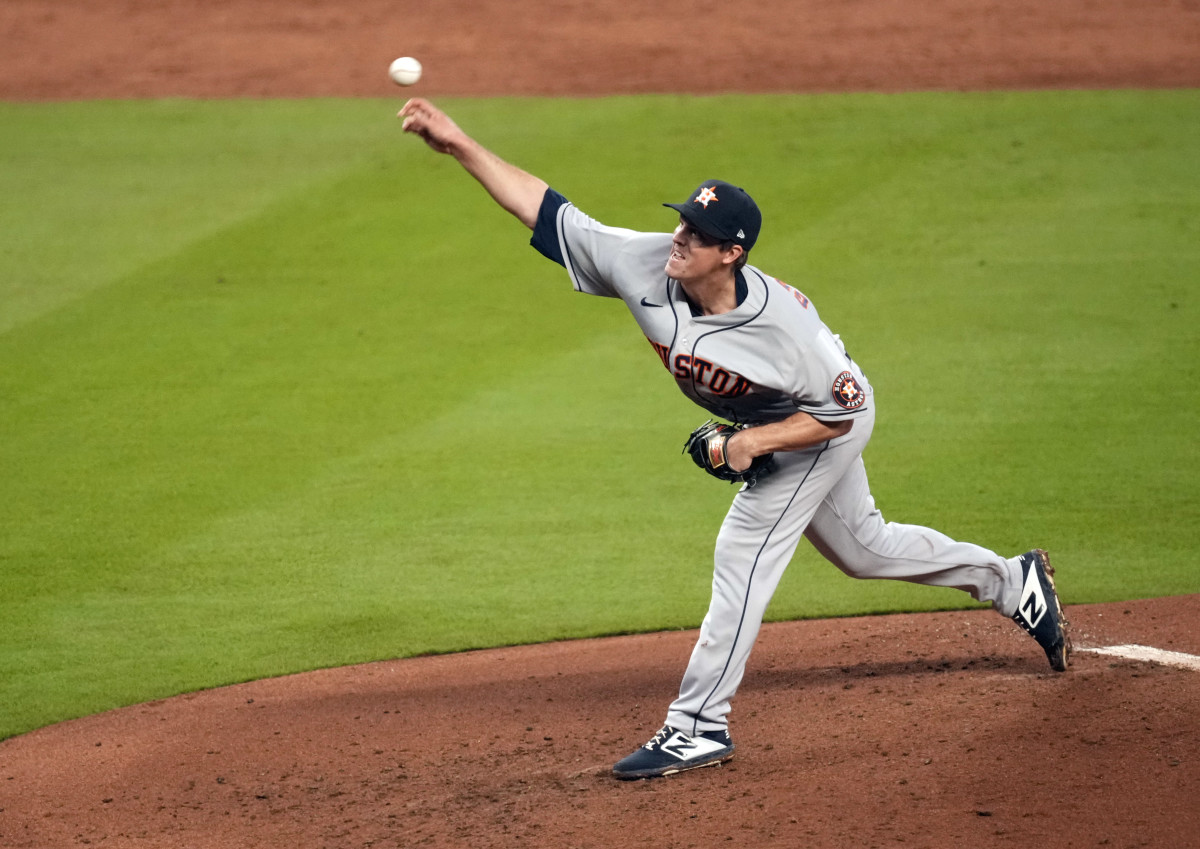 Oct 30, 2021; Atlanta, Georgia, USA; Houston Astros starting pitcher Zack Greinke (21) throws against the Atlanta Braves during the third inning of game four of the 2021 World Series at Truist Park. Mandatory Credit: Dale Zanine-USA TODAY Sports