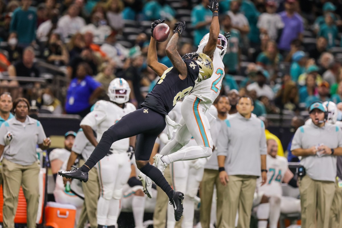 New Orleans Saints wide receiver Lil'Jordan Humphrey (84) catches a pass against Miami Dolphins cornerback Byron Jones (24). Mandatory Credit: Stephen Lew-USA TODAY Sports