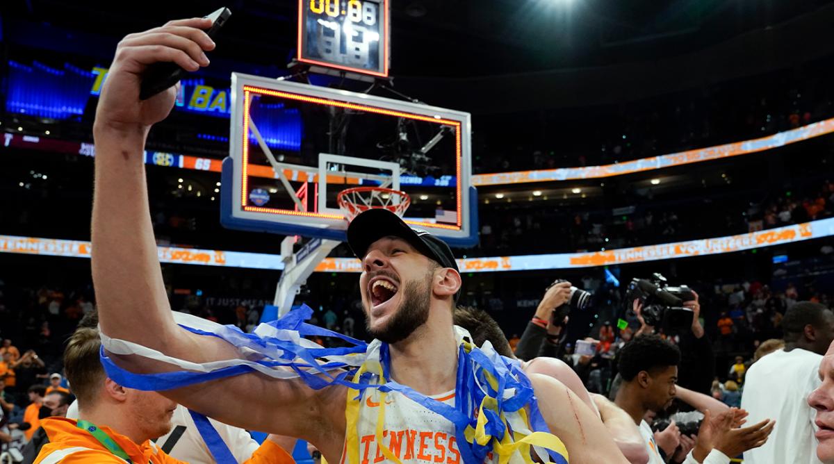 Tennessee forward Uros Plavsic (33) celebrates after the team defeated Texas A&M during an NCAA men’s college basketball Southeastern Conference tournament championship game Sunday, March 13, 2022, in Tampa, Fla.
