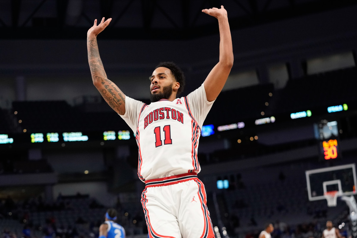 Mar 13, 2022; Fort Worth, TX, USA; Houston Cougars guard Kyler Edwards (11) celebrates after scoring against the Memphis Tigers during the second half at Dickies Arena. Mandatory Credit: Chris Jones-USA TODAY Sports