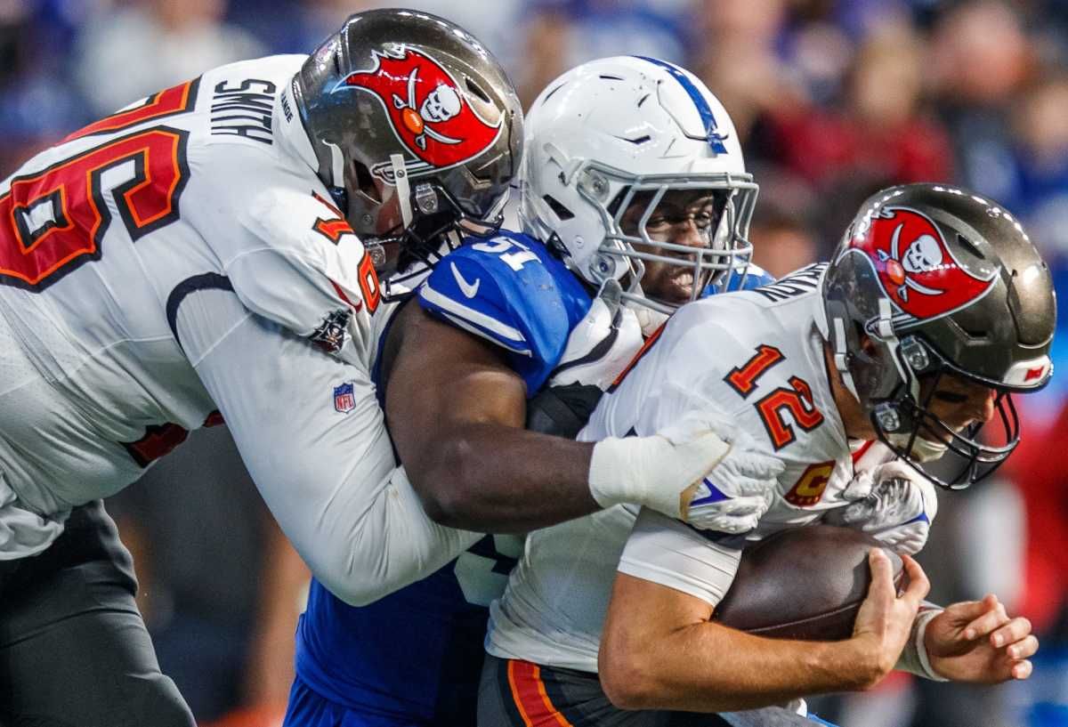 Indianapolis Colts defensive end Kwity Paye (51) sacks Tampa Bay Buccaneers quarterback Tom Brady (12) on Sunday, Nov. 28, 2021. Indianapolis Colts Host Tampa Bay Buccaneers