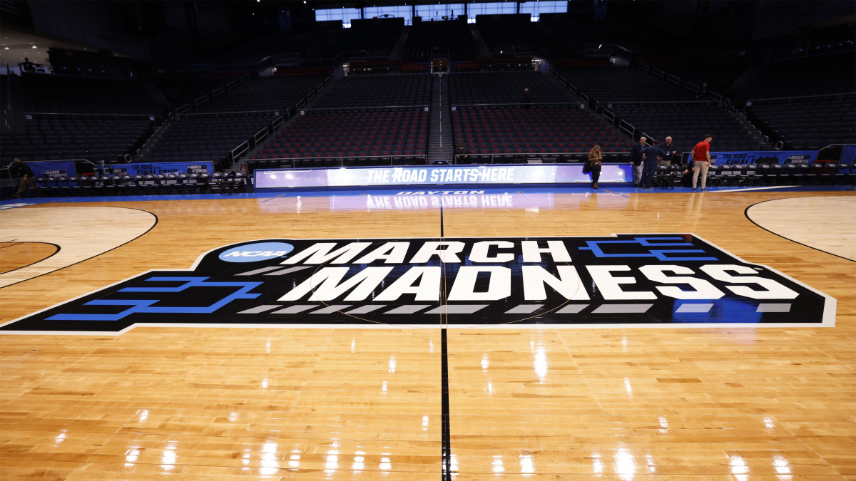 The NCAA March Madness logo at midcourt