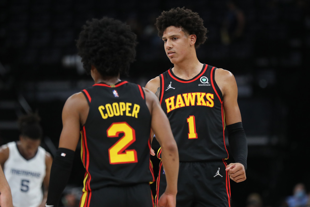 Oct 9, 2021; Memphis, Tennessee, USA; Atlanta Hawks forward Jalen Johnson (1) and guard Sharife Cooper (2) talk during a time-out during the second half against the Memphis Grizzlies at FedExForum.