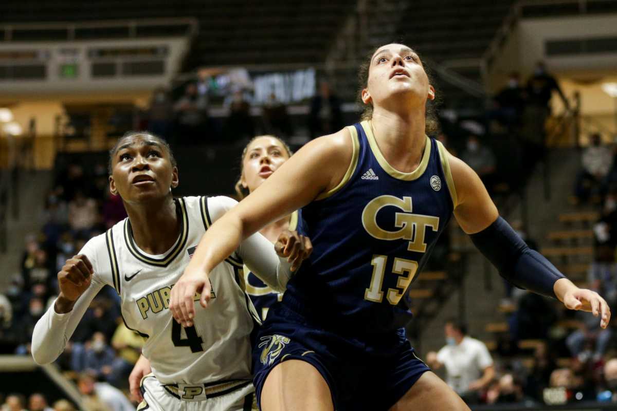 Purdue guard Mide Oriyomi (4) is boxed out by Georgia Tech forward Lorela Cubaj (13) during the first quarter of an NCAA women's basketball game, Wednesday, Dec. 1, 2021 at Mackey Arena in West Lafayette. Bkw Purdue Vs Georgia Tech
