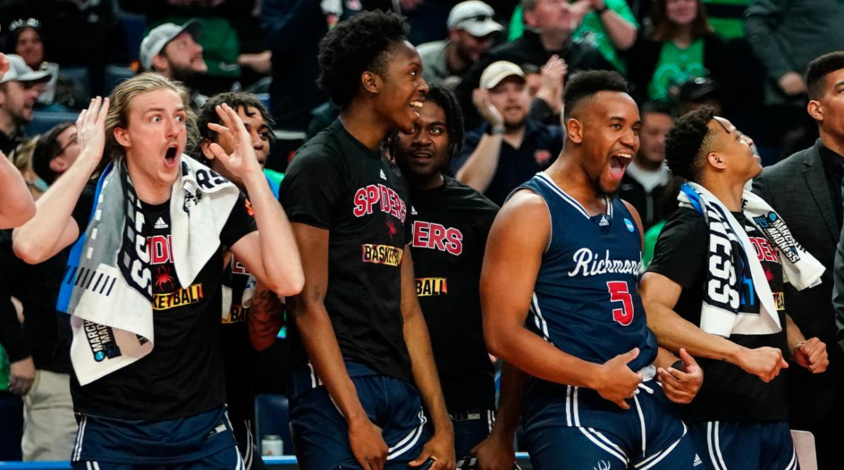 Richmond’s Nick Sherod (5) celebrates with teammates in the second half of a college basketball game against the Iowa during the first round of the NCAA men’s tournament, Thursday, March 17, 2022, in Buffalo, N.Y.