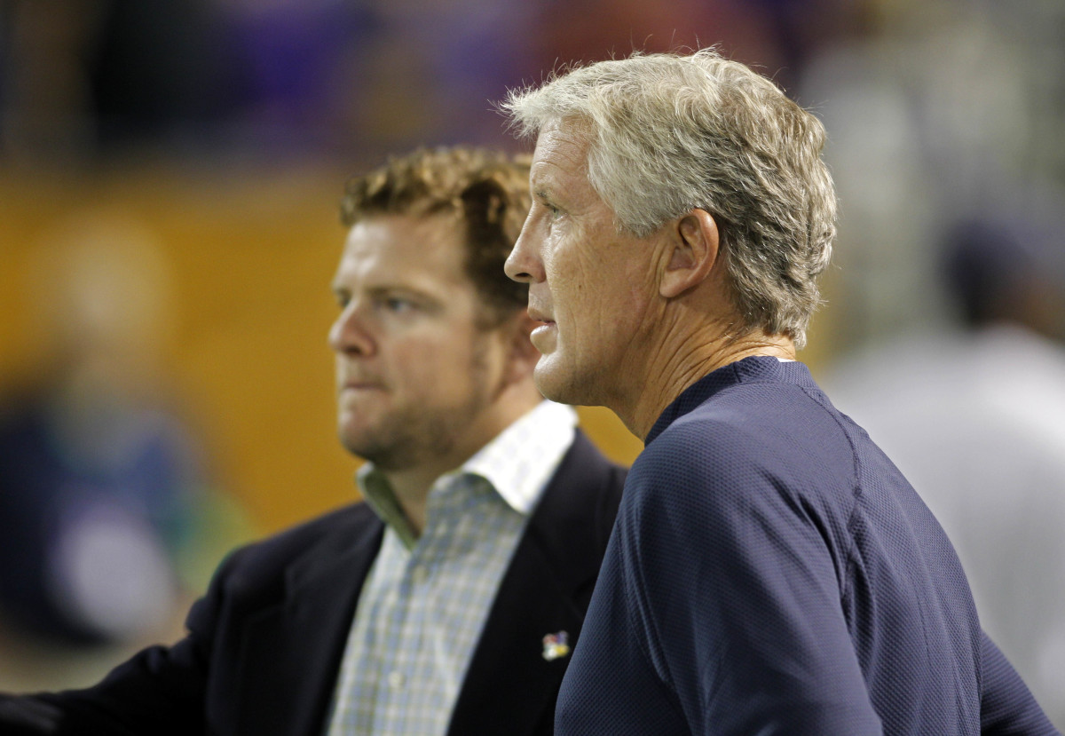 NFL: Preseason-Seattle Seahawks at Minnesota Vikings Aug 28, 2010; Minneapolis, MN, USA; Seattle Seahawks head coach Pete Carroll speaks with general manager John Schneider prior to the game against the Minnesota Vikings at the Metrodome.