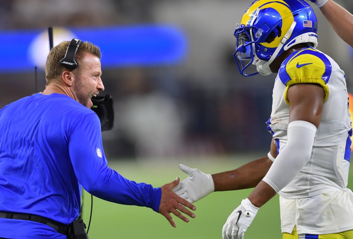 Los Angeles Rams head coach Sean McVay congratulates wide receiver Robert Woods (2) after a touchdown in the fourth quarter against the Chicago Bears at SoFi Stadium.