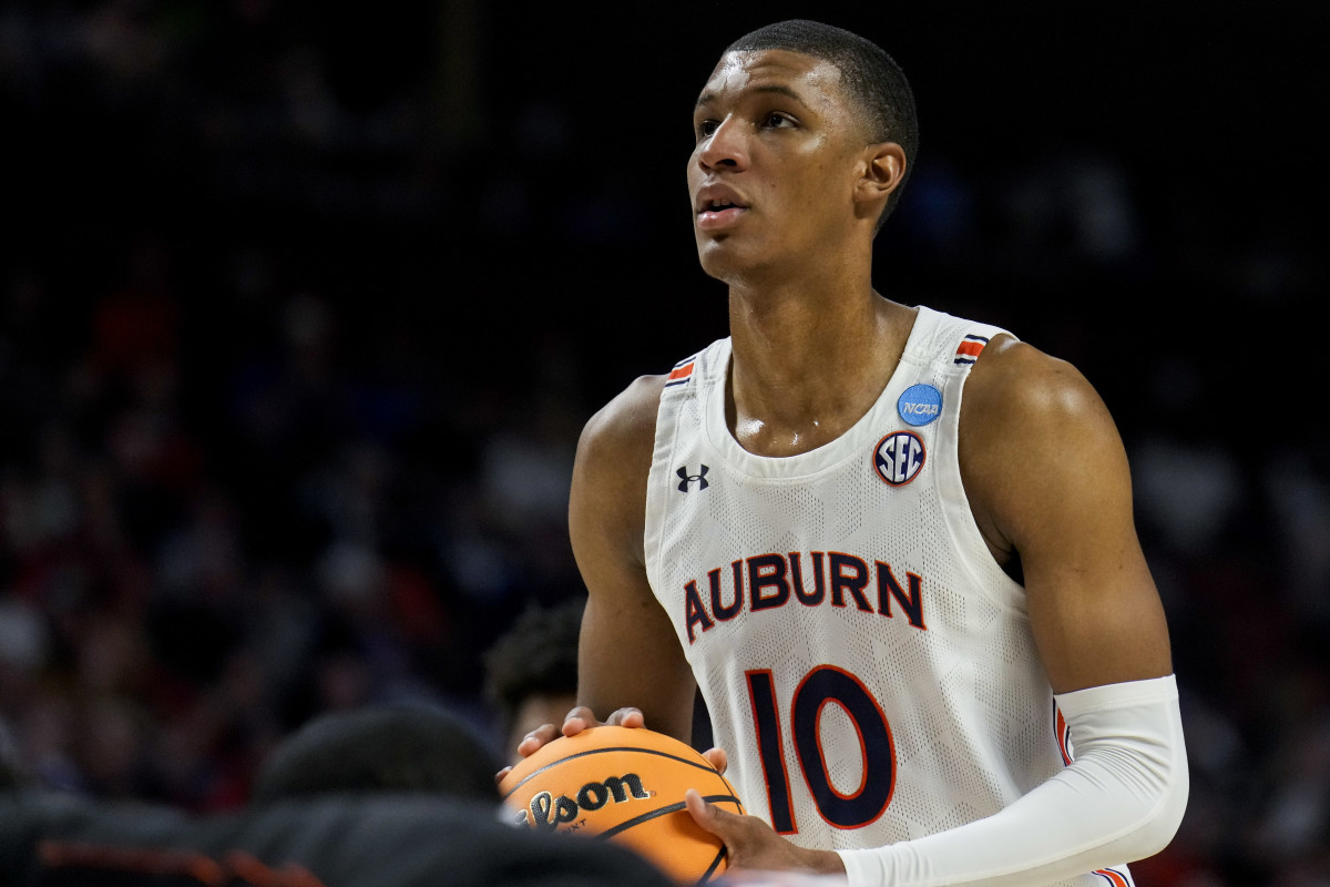 Mar 20, 2022; Greenville, SC, USA; Auburn Tigers forward Jabari Smith (10) attempts a free throw against the Miami (Fl) Hurricanes in the first half during the second round of the 2022 NCAA Tournament at Bon Secours Wellness Arena. Mandatory Credit: Jim Dedmon-USA TODAY Sports