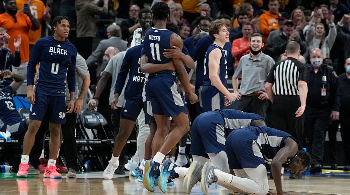 Saint Peter’s players celebrate after defeating Murray State in a college basketball game in the second round of the NCAA tournament, Saturday, March 19, 2022, in Indianapolis.