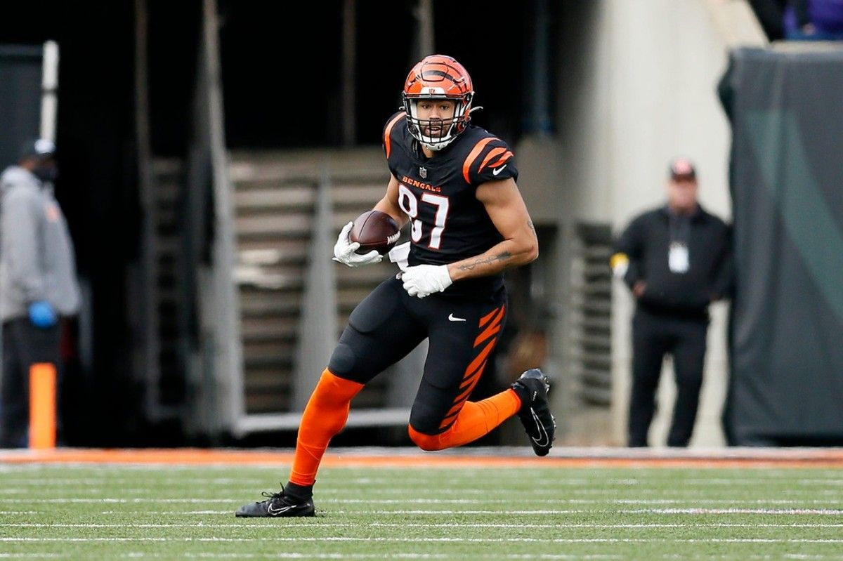 Cincinnati Bengals TE C.J. Uzomah runs after catch