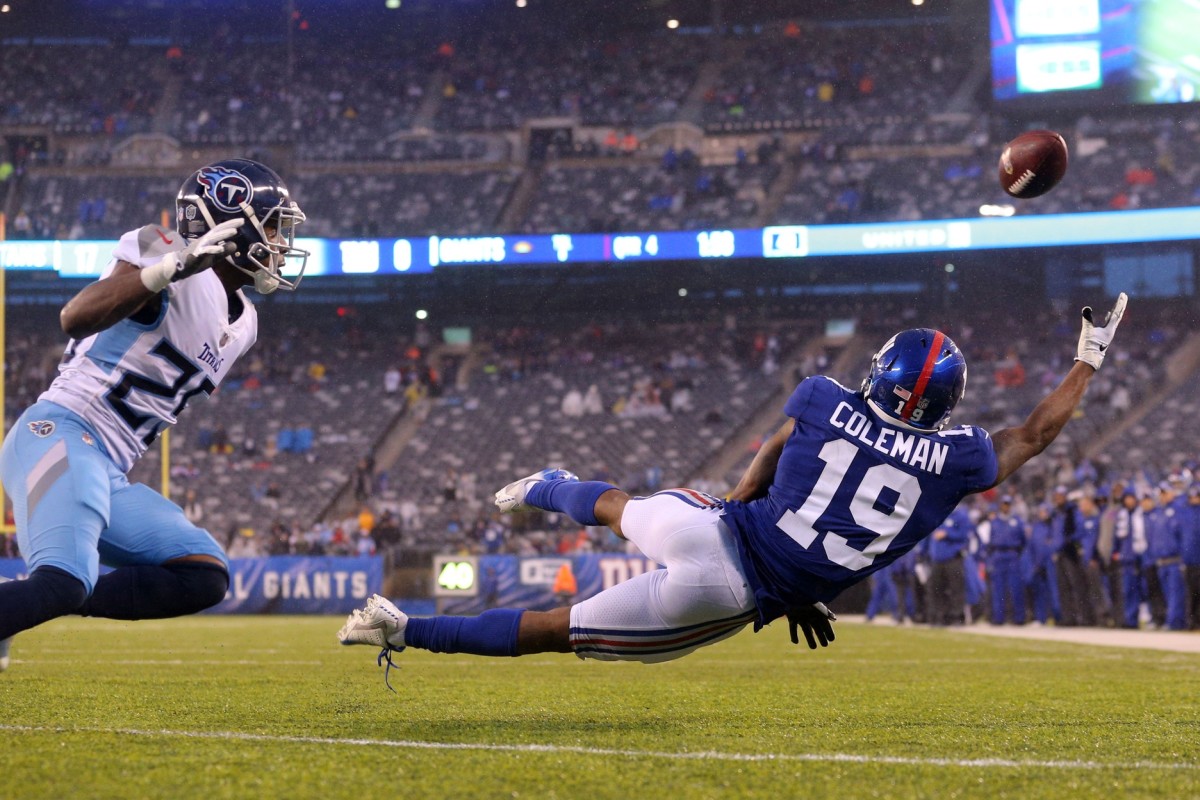 Dec 16, 2018; East Rutherford, NJ, USA; New York Giants wide receiver Corey Coleman (19) can't catch a pass in the end zone against Tennessee Titans cornerback Adoree' Jackson (25) during the fourth quarter at MetLife Stadium. Mandatory Credit: Brad Penner-USA TODAY Sports
