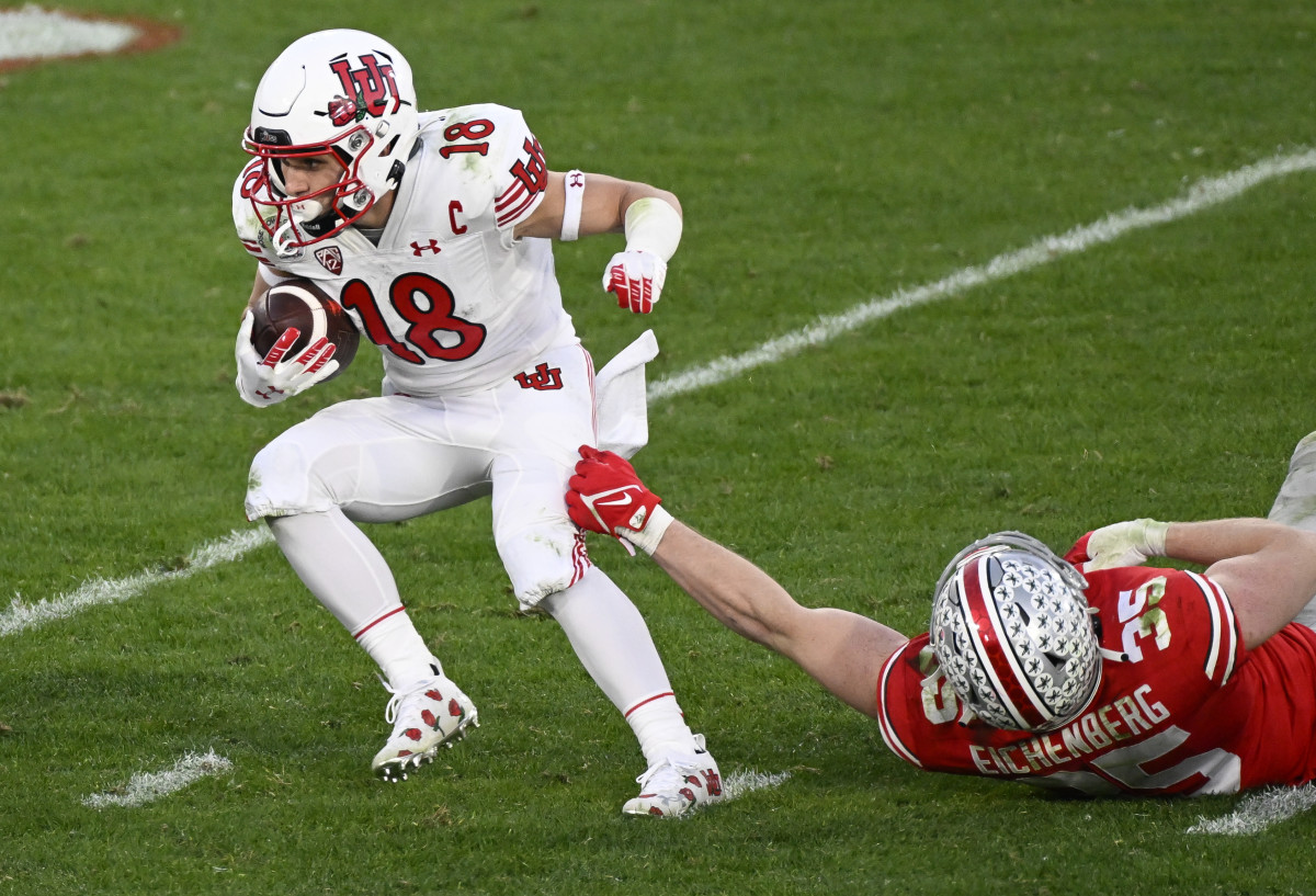 Utah Utes wide receiver Britain Covey (18) breaks away from Ohio State Buckeyes linebacker Tommy Eichenberg (35) during the third quarter of the 2022 Rose Bowl at Rose Bowl. Mandatory Credit: Robert Hanashiro-USA TODAY Sports.