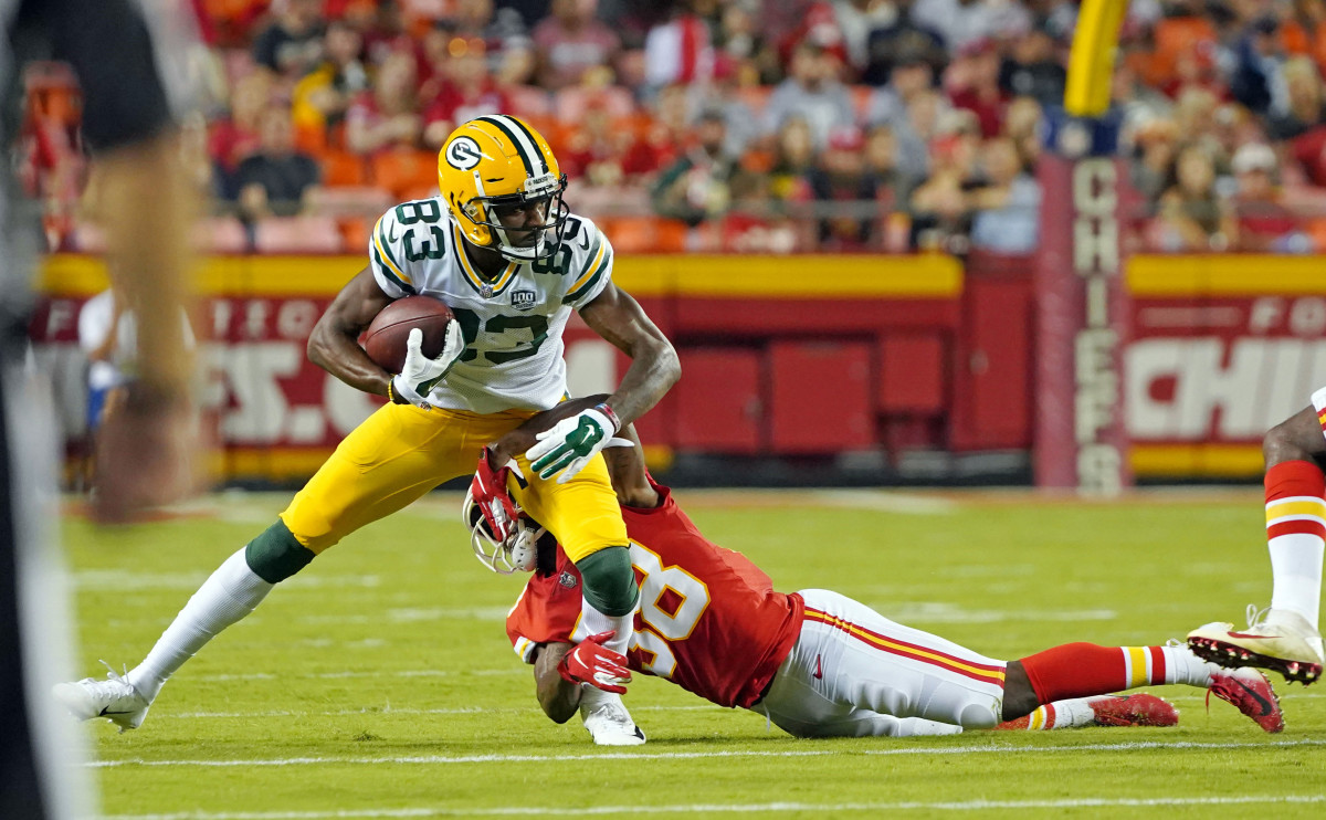 Aug 30, 2018; Kansas City, MO, USA; Green Bay Packers wide receiver Marquez Valdes-Scantling (83) runs against Kansas City Chiefs defensive back Arrion Springs (38) in the first half at Arrowhead Stadium. Mandatory Credit: Jay Biggerstaff-USA TODAY Sports