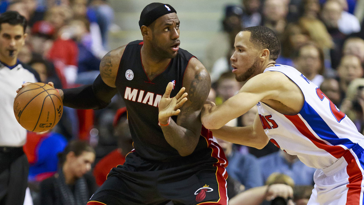 Miami Heat small forward LeBron James is defended by Detroit Pistons small forward Tayshaun Prince.