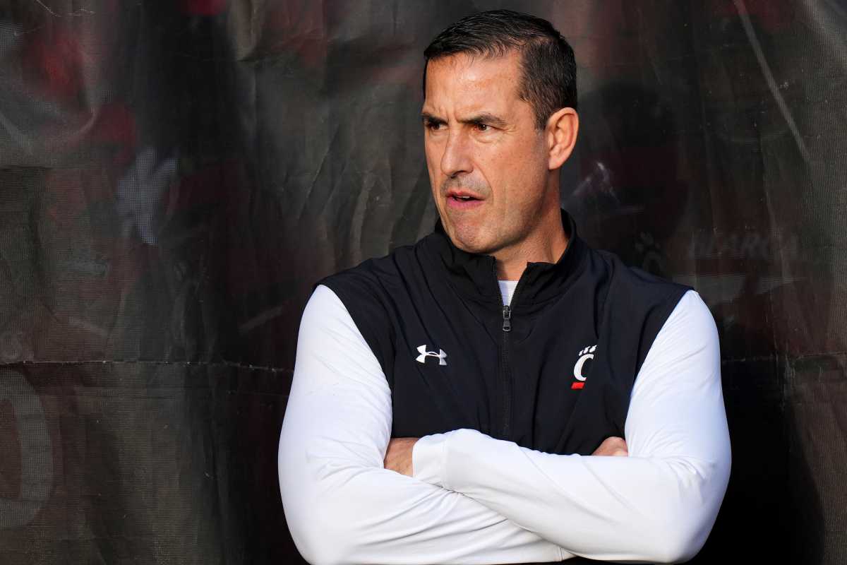 Cincinnati Bearcats head coach Luke Fickell gets set to take the field before kickoff of the first quarter during the American Athletic Conference championship football game between the Houston Cougars and the Cincinnati Bearcats, Saturday, Dec. 4, 2021, at Nippert Stadium in Cincinnati. Houston Cougars At Cincinnati Bearcats Aac Championship Dec 4