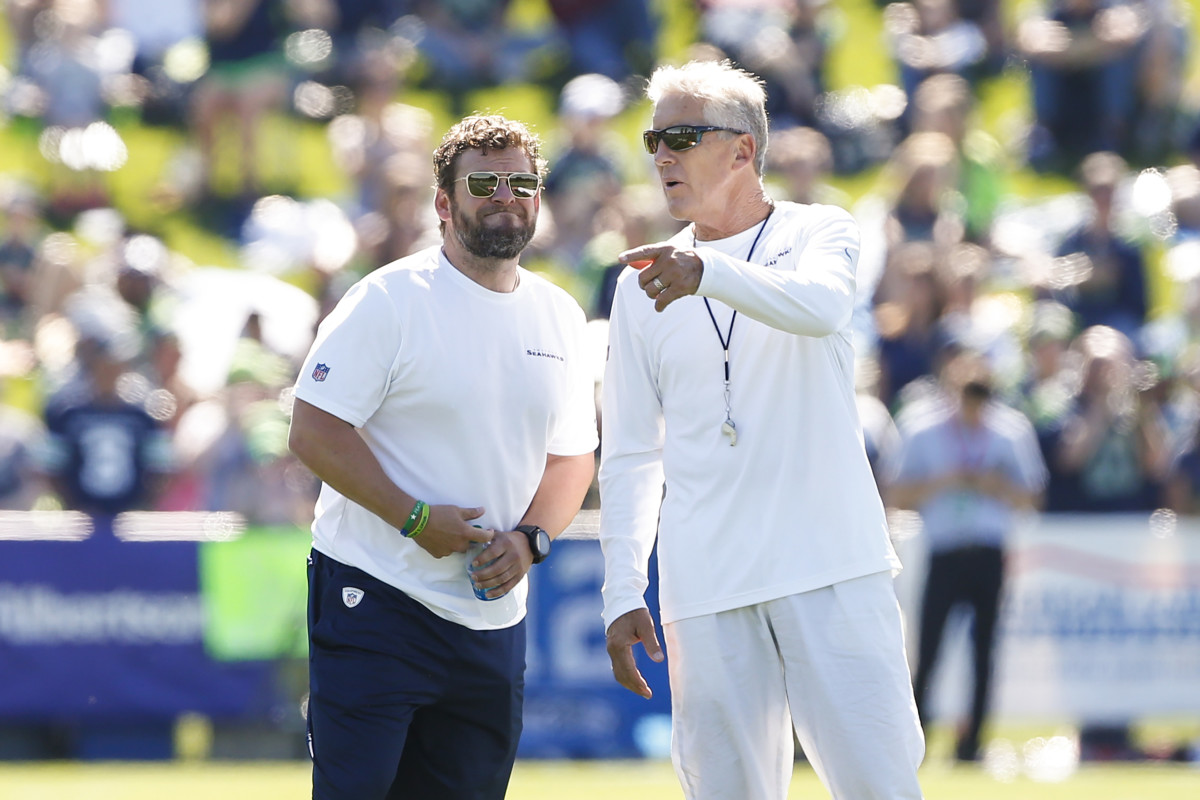 NFL: Seattle Seahawks-Training Camp Jul 25, 2019; Renton, WA, USA; Seattle Seahawks head coach Pete Carroll, right, talks with general manager John Schneider during training camp practice at the Virginia Mason Athletic Center.