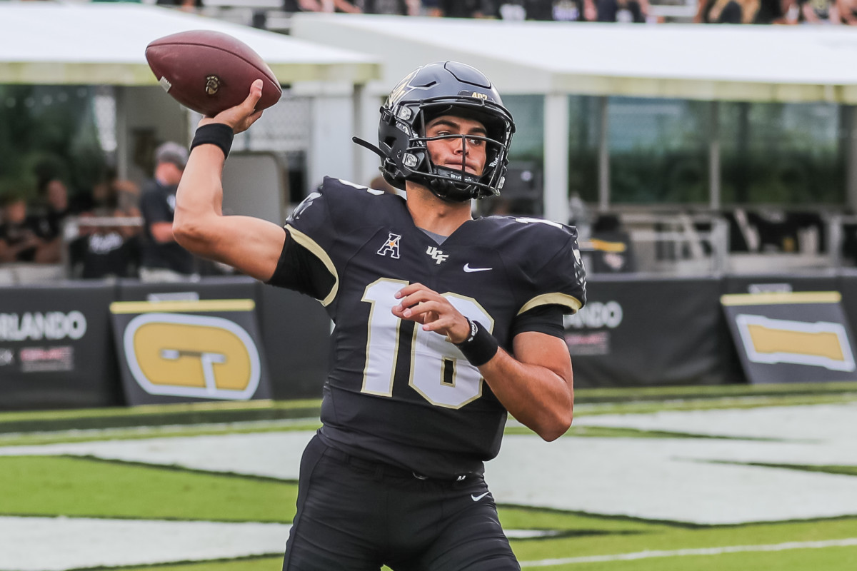 Nov 26, 2021; Orlando, Florida, USA; UCF Knights quarterback Mikey Keene (16) warms up before the game against the South Florida Bulls at Bounce House. Mandatory Credit: Mike Watters-USA TODAY Sports