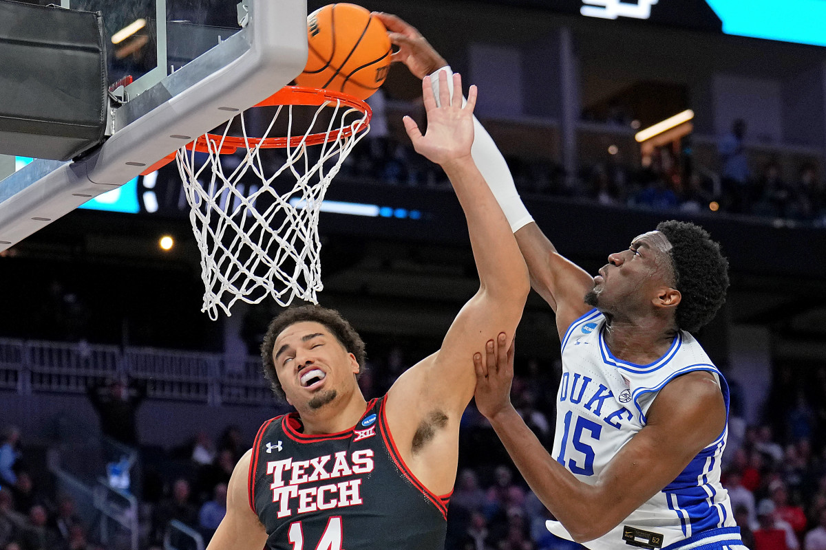 Duke Blue Devils center Mark Williams (15) dunks over Texas Tech Red Raiders forward Marcus Santos-Silva (14) during the second half in the semifinals of the West regional of the men's college basketball. Duke will now take on Arkansas in the Elite 8.
