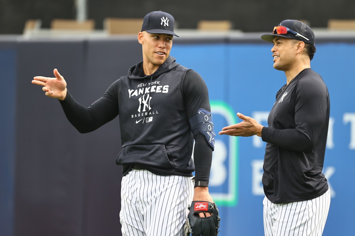 Yankees OF Aaron Judge, Giancarlo Stanton talking during spring training